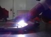 32 tack welding the arm every 2 or 3 slits.JPG