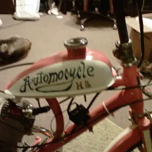 Hand-painted "Automocycle HB" logo on tank. ("Automocycle" was inspired by Futurama; "HB" is in paying homage to the original "Hyda Bike").