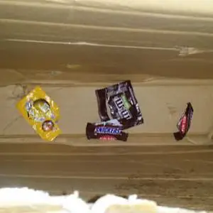 Fiends! After beating the box to within an inch of its holdability  they clearly ate all the candy Labrat was trying to send me and put the wrappers b