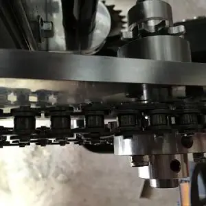 Half link for chain adjustment for jack shaft