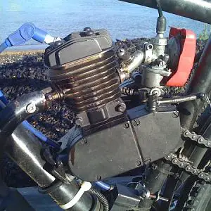 skyhawk 66cc with speed carb ported intake and exhaust,gutted exhaust pipe ,msd spark plug wire ,boost bootle