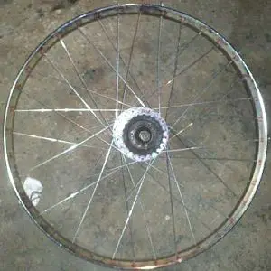 The finished wheel!  11 gauge spokes on a puch hub, going to a m.o manufacturing rim.   Should hold up for a while.
