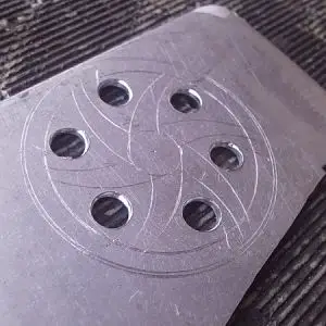Pulley cover drawn on piece of aluminum and pilot holes drilled.....