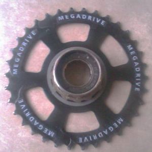 Start putting sprockets and spacers on.  Sun Race 34 sprocket.