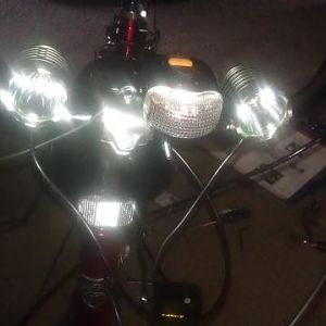 My new Headlights 2 Cree 1200 Lumins a piece = 2400 Lumins! These lights go from high beam to medium to low beam and strobe!! Love them!!
