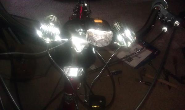 My new Headlights 2 Cree 1200 Lumins a piece = 2400 Lumins! These lights go from high beam to medium to low beam and strobe!! Love them!!
