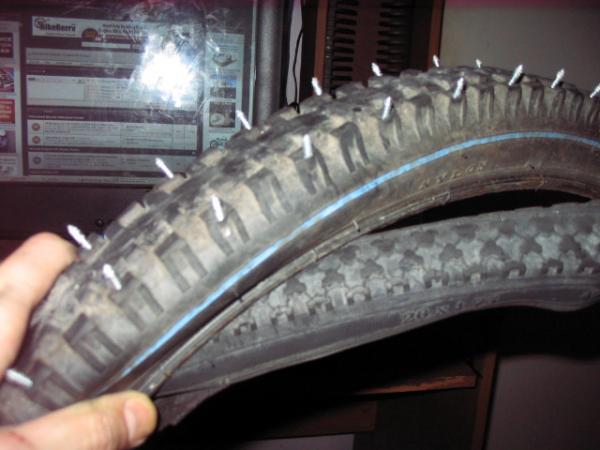 old tire with beads cut off as a liner under the screws, works well.