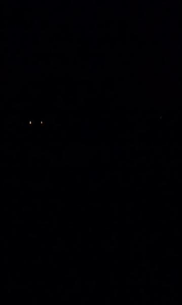 Pic of my back yard with no lights to show how pitch black it is before turning my headlights on!