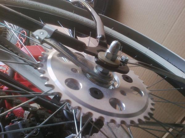 pirate cycles adapter 40t,oversized washers to help hold wheel on.