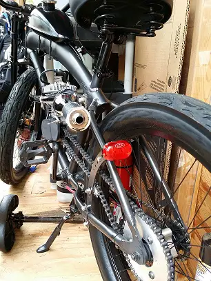 tail light attached to Chain tension arm