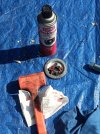 Brake cleaner cleaning any oily residue from pads.jpg