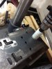 Plate modification drilling out.jpg