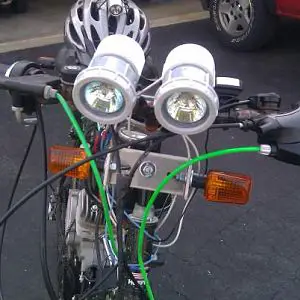 front view of my bike with my 2 homemade halogen lights 20wt's a pc very bright when rideing at night also front blinker set up.