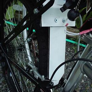 Fender / rear rack pivot brace attached to the platform of the  Rear Rack and to the Crossmember that would be used for the old style  brakes