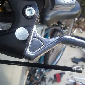 Just a little bonus pic. My clutch lever had a triangular hole in it that bugged me as well, especially since it didn't match the brake handle. I plug