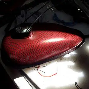 Gas tank, after red paint and clear coating.