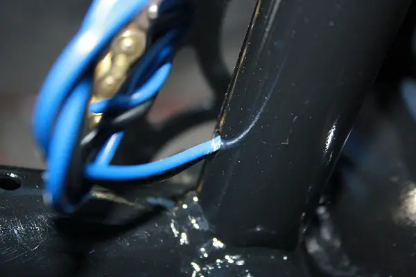 037
Connection goes through and up the down tube.
Wrapped together with the On/Off wire. Where it meets at the down tube.