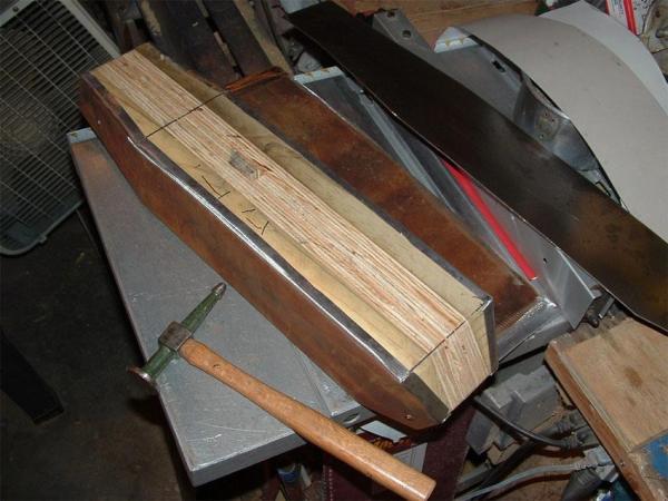 11- Tank panels formed around a wooden buck.