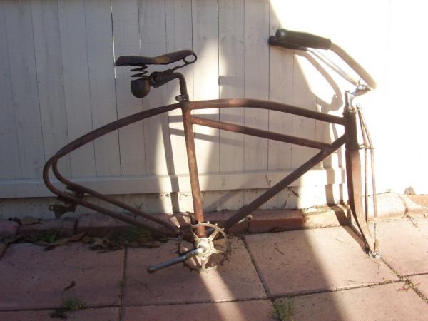 1937 Colson Double Bar Junior. had to cut the cranks and the forks off. the headset and BB had become one with the bike. don't say "you coulda used he
