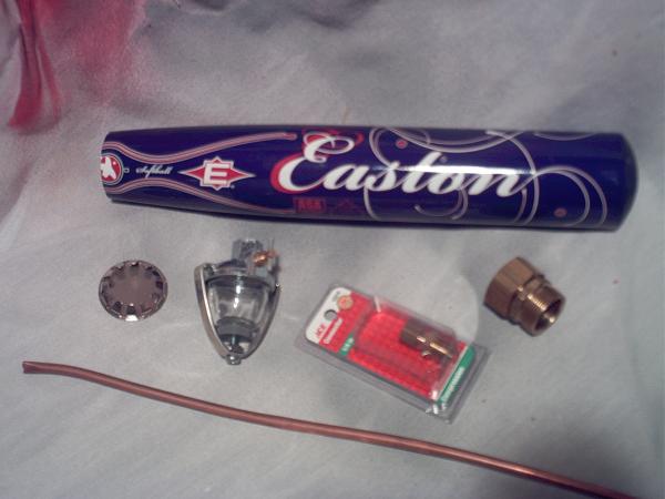 A softball bat, cut short; a glass bowl fuel filter; some copper line and some brass fittings.  Everything I needed to build the "Bat Tank".  Well, no