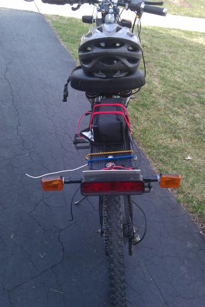 back view of my old bike this was my first build as you can see i had blinkers and tail light  set up on it that ran off a 12 volt battery thats is ab