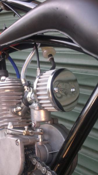 before paint job but after mods:

66cc HT engine
Rock solid "Billet high compression Head"
SBP expansion chamber 
boost bottle
Speed Carby with