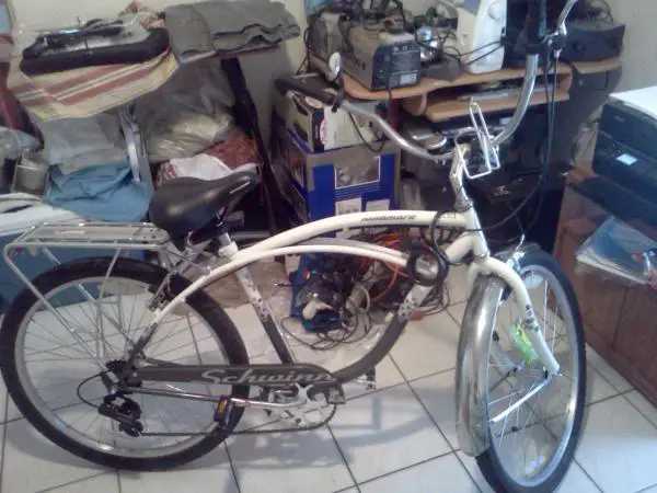 Bought the cup holder and rack

Seat is squeeky, Wheels need truing, Since it has gears the arm that moves to change gears is out of place so the ch