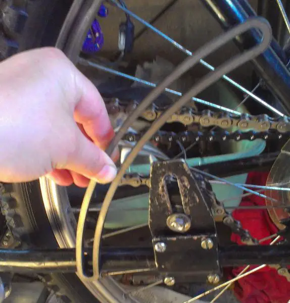 Custom Motored Bikes Arc Tensioner goes on like so, with some bolts or a few welds.