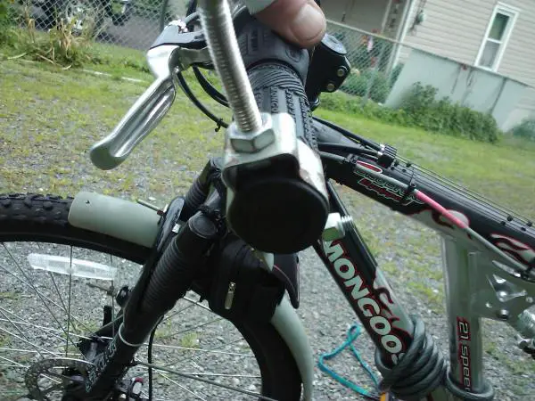 Didnt like the bracket that came with the mirror and left the mirror too inbound. I used a conduit clamp here that usually attaches to electrical stru