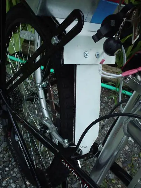 Fender / rear rack pivot brace attached to the platform of the  Rear Rack and to the Crossmember that would be used for the old style  brakes