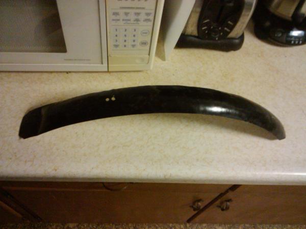 first attempt at a fender that I hammered out of aluminum.