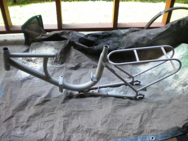 Frame with custom mounts/brackets, under primer.