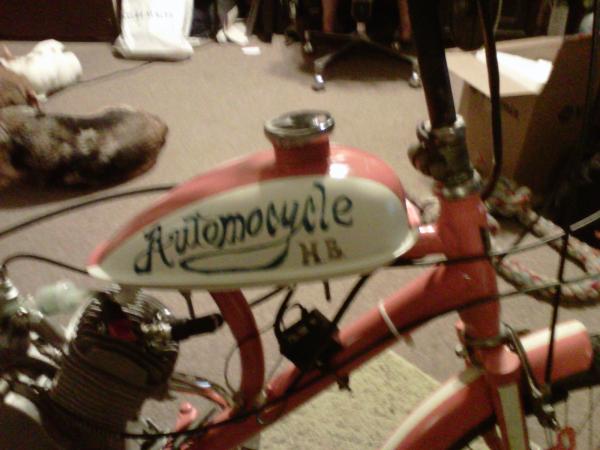 Hand-painted "Automocycle HB" logo on tank. ("Automocycle" was inspired by Futurama; "HB" is in paying homage to the original "Hyda Bike").