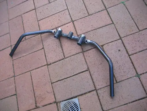 Handle bars are 7/8" and have been set up in jig to weld sleeves in place for the forks.....have also welded cross tubes for pivots for the mechanical