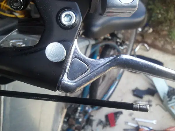 Just a little bonus pic. My clutch lever had a triangular hole in it that bugged me as well, especially since it didn't match the brake handle. I plug