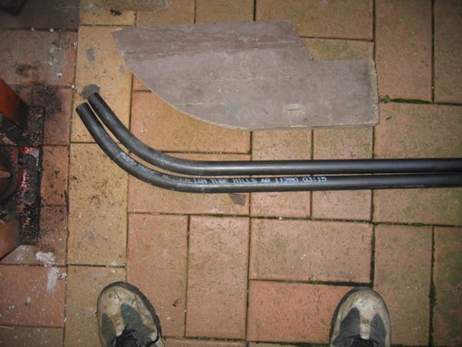 Main fork tubes  ... bent in pipe bender useing mandrels....pipe is 1"  x  .125 wall....used a lumber profile to get correct bends