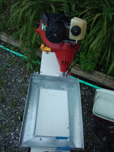 My cooler rack pan that allows my cooler (aka trunk aka water proof carryall) to my rack platform. Does move around and only takes one  bungy to hold