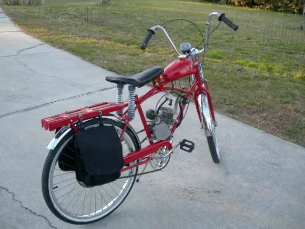 Note here the vintage luggage rack purchased on Ebay. There is no tail light and the bike retains its stock fenders at this point. At this point, I wa