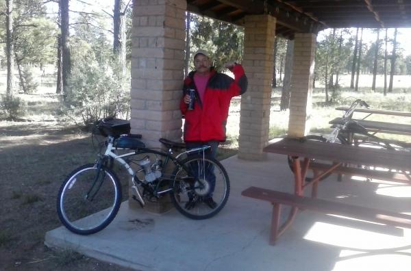 Scotty and his ancient Huffy frame with Dax motor, Murder in the background.