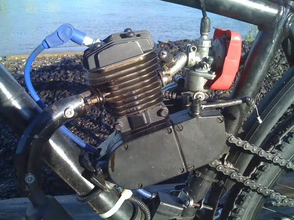 skyhawk 66cc with speed carb ported intake and exhaust,gutted exhaust pipe ,msd spark plug wire ,boost bootle