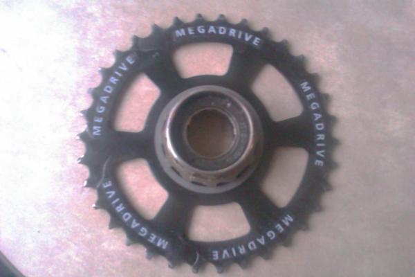 Start putting sprockets and spacers on.  Sun Race 34 sprocket.