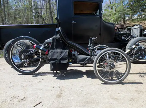 Tadpole build, Lifan 49cc four stroke & 48v electric hub: http://motorbicycling.com/f44/bent-zombie-tribrid-tadpole-trike-r-24210.html