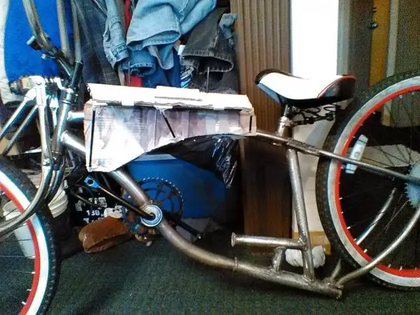The cardboard on the bike is a template I am making for the gas tank I am going to build on the bike.