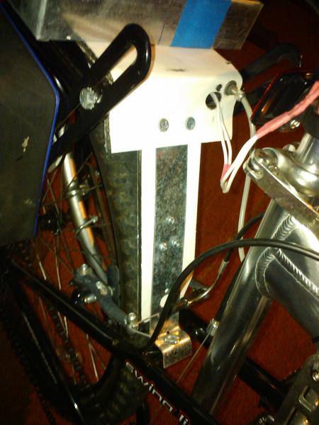 The Laminator composit panel I was using to tie the rack to the rear tire forks had broken going over some really rough terrain..( its just aluminum s
