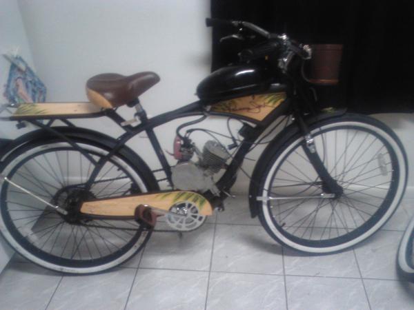 the ultimate beach cruiser. A 66cc engine and a beer opener on the fork.. Yeah Buddy