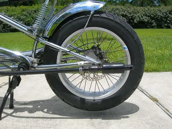 This muffler is unresticted and allows the engine to breath a little deeper, but it is louder than I like for riding in residential areas.  Screwing t