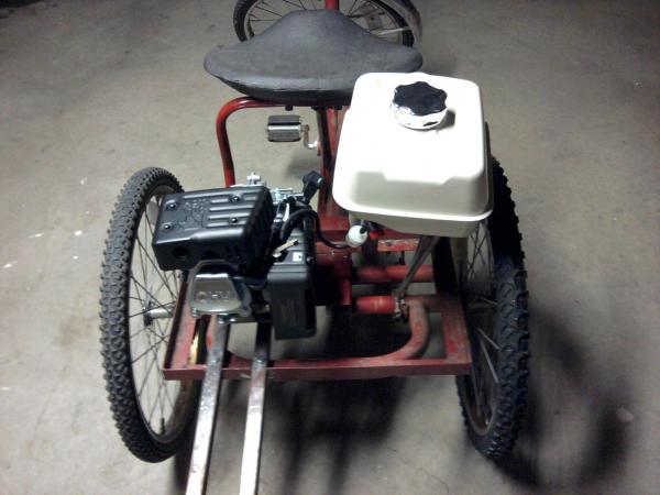 took off the small gas tank and added a 1 1/2 gallon gas tank