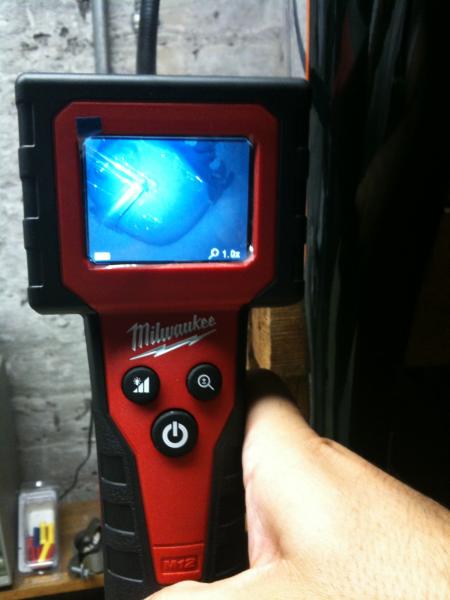 Using an inspection camera to seal the frame