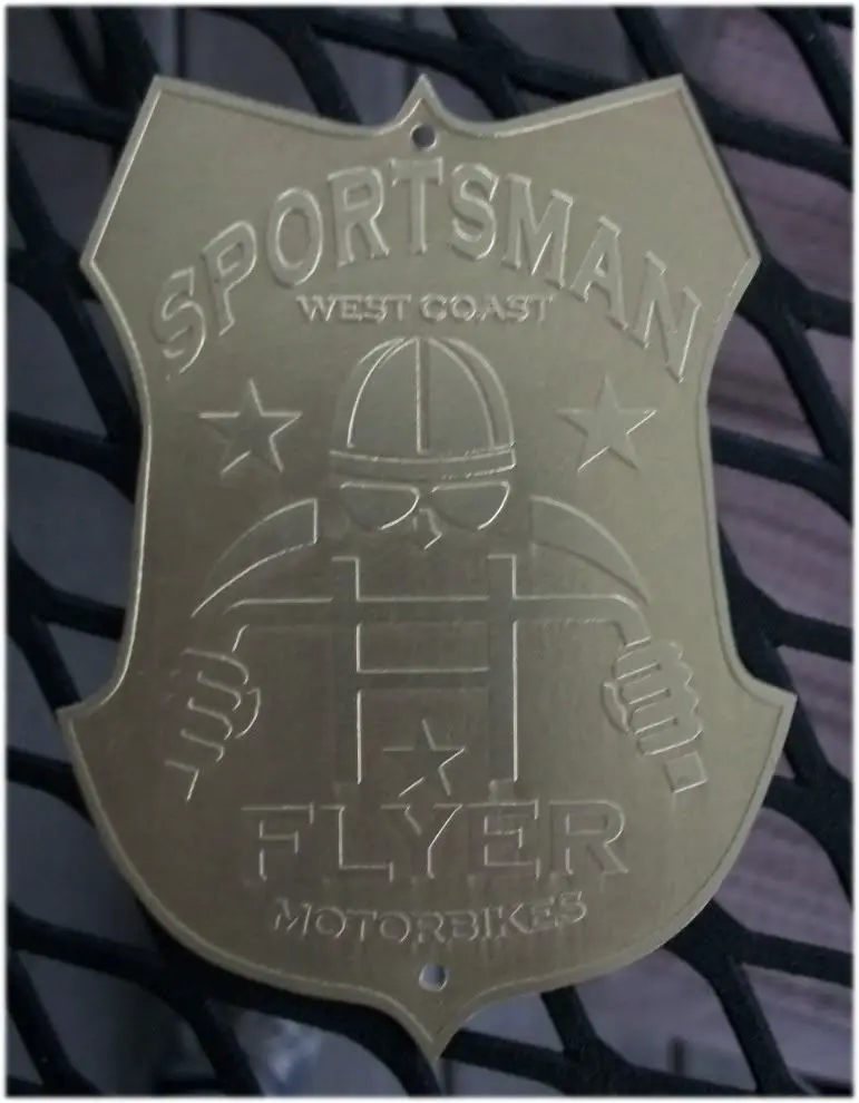 BRASSFLYERBADGE.jpg